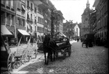 Spitalgasse et fontaine du joueur de cornemuse